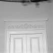 Ground floor, sitting room, pediment above door, decorative plasterwork, detail