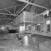 Interiorview of main kitchen showing oven and extraction hood.