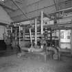 Interior view of boiler house pump room and hot water system.