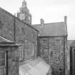 View of rear of tolbooth, assembley hall and conservatory from W