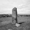 Windhill, standing stone east of main road.
