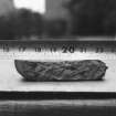 Clay mould for the escutcheon of a hanging bowl from Craig Phadrig 1971 excavation. Section view, scale in cms. In MS7262/5