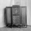 Triple cupboard with drawers and marguetry decoration.