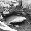 Excavation Photograph: Capstone of submural grave. pl.xxxv.1.