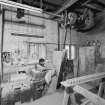 Edinburgh, Portobello, Pipe Street, Thistle  Potteries, interior.
View of throwing shed with detail of potter's wheel and belt-drive. Philip Christieson the last ever thrower on the wheel.