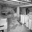 Edinburgh, Portobello, Pipe Street, Thistle Potteries Street.
Interior view of store adjacent to dipping-houses, with detail of brick floor.