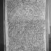 Photographic copy of a rubbing showing the bottom half of the face of a cross slab, from Farr Old Church, Clachan.