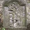 View of headstone showing Adam and Eve and tree, Polmont Old Churchyard.