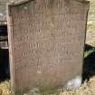 View of headstone with inscription to McMonies children d. 1790-93, Kirkandrews Old Church burial ground.