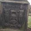 View of headstone to John and Alex McLean d. 1738 with tailor's tools, St Mary's Church burial ground, Banff.
