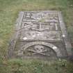 Detail of graveslab 1629 with anchor of mariner and tools of shipwright, Michael Kirk burial ground, Gordonstoun.