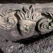 Detail of tablestone to Robert Bary d. 1682, west end with carving of a green man; Kinloss Abbey burial ground.