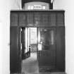 Interior view of Glasgow School of Art showing basement corridor doorway at E end from W.