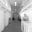 Interior view of Glasgow School of Art showing E corridor in basement from E.