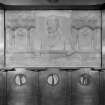 Interior view of Glasgow School of Art showing detail of memorial panel to James Fleming in main staircase.