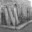 View of sculptured stones in railed enclosure, St Nathalan's Kirk, Tullich.