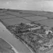 General View, Cochran and Co Annan Ltd. Newbie, Dumfries and Galloway, Scotland. Oblique aerial photograph taken facing South/West.