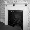 Third floor South East bedroom, detail of fireplace