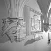 Religious corridor, interior, detail of plaster corbels and rectangular panel.