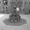 Courtyard, fountain, view from 1st. floor of range to west