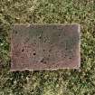 Detail of grave-slab bearing incised calvary cross.