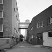 Alloa, Whins Road, Brewery
View from NNE of roadway with hop store and brine mixing areas on right, lager maturation area on left with walkway from fermentation area over roadway. The hop store was originally the granulated sugar stores until liquid sugar was introduced in the 1970s