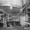 Alloa, Whins Road, Brewery, Brewhouse, interior, basement
View of underside of mash tun no. 2. with trub vessel on right. The trub vessel contains deposits left after the wort is pumped from the copper to the whirlpool where residual sediments are removed by a centrifuge