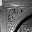 Ground floor, bar (former drawing room), archway above inglenook fireplace, decorative woodwork, detail