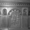 Second floor, library, carved panel on overmantel, detail
