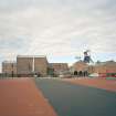 General view of S portion of colliery surface buildings from E following the demolition of the north end of the neighbouring workshops and the construction of a carpark for the museum.