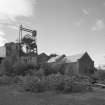 Newtongrange, Lady Victoria Colliery, Engine Houses, Pithead, and Woodroad Stores
View from NE of pithead including headframe, and Woodroad Stores