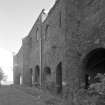 Newtongrange, Lady Victoria Colliery, Pithead Building (tub Circuit, Tippler Section, Picking Tables)
Oblique view from SW along N end of W facade of colliery showing brick arches and buttresses