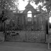 View of former half time school through wrought iron gate