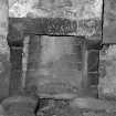 Detail of fireplace in farmhouse kitchen.