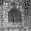 Detail of arrow-slit and embrasure in the Warden's Tower, viewed from interior.