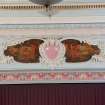 Interior.
Detail of plasterwork and painted decorative panels on proscenium arch.