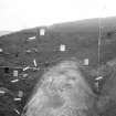 Excavation photograph : area 2 - kubiana tins in situ, f2289-90.