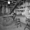 Interior.
View on first floor of mill showing sieves and fanner.