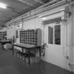 Interior. View of canopied doors original entrance to worship space in North wall of main warehouse from East South East