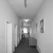 Interior. View of second floor East/West corridor from West