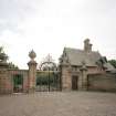 View of gates and lodge from W.