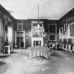 Copy of historic photograph showing interior view of dining room.
