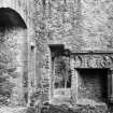 Interior view of fireplace in private room at Huntly Castle.