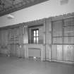 View of library from West showing fireplace and fitted bookshelves