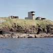 View from SW in Switha Sound showing World War II Battery Observation Post and twin 6-pounder gun-emplacement with one of the 12-pounder gun-emplacements.
