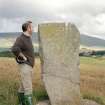 View of Craw Stane from SW; Dr Ian Fraser (RCAHMS) in picture