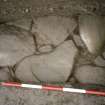 Detail of paving at NE corner of the excavation trench. Scale in 200mm divisions