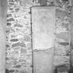 View of fragmented graveslab in Lamont Aisle at Kilfinan Churchyard.