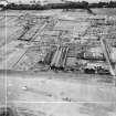 Carnoustie, general view, showing Anderson-Grice Co, Ltd, Taymouth Engineering Works, Golf Street, Barry, Angus, Scotland, 1949. Oblique aerial photograph taken facing north.  This image has been produced from a crop marked negative.