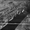 Glasgow, general view, showing Barclay, Curle and Co, Ltd, Elderslie Shipyard and Dumbarton Road,   Scotstoun, Renfrew, Lanarkshire, Scotland, 1950. Oblique aerial photograph taken facing east.  This image has been produced from a crop marked negative.